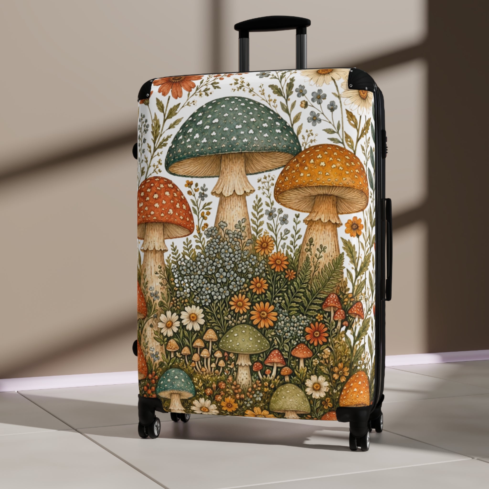 A hard-shell rolling suitcase with a detailed vintage-style mushroom and wildflower print, standing upright on a light-colored tiled floor against a beige wall with soft window shadows.