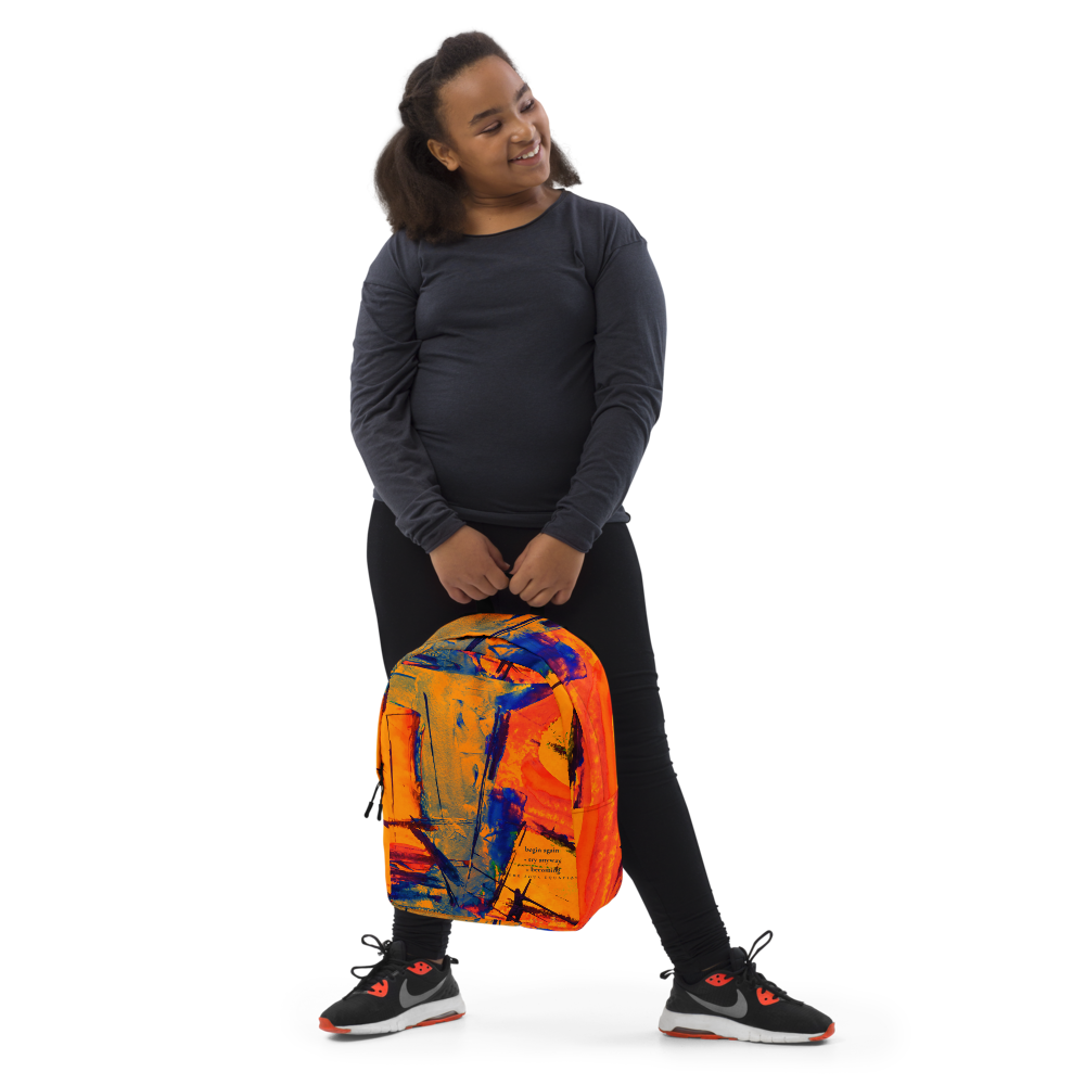A woman wearing a dark gray long-sleeve shirt, black leggings, and black Nike sneakers holds a vibrant abstract-print backpack with orange, blue, and yellow colors against a solid white background.